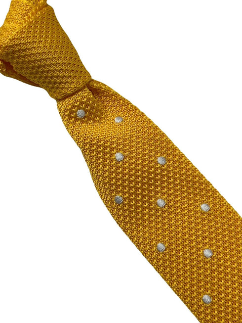 Yellow gold knitted tie with white polka spots
